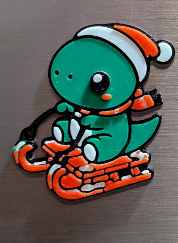 Sledding Dino Magnet